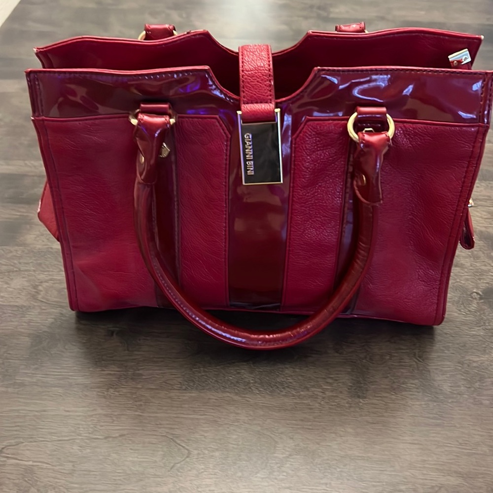 Unique red Gianni Bini with beautiful black and white lining.